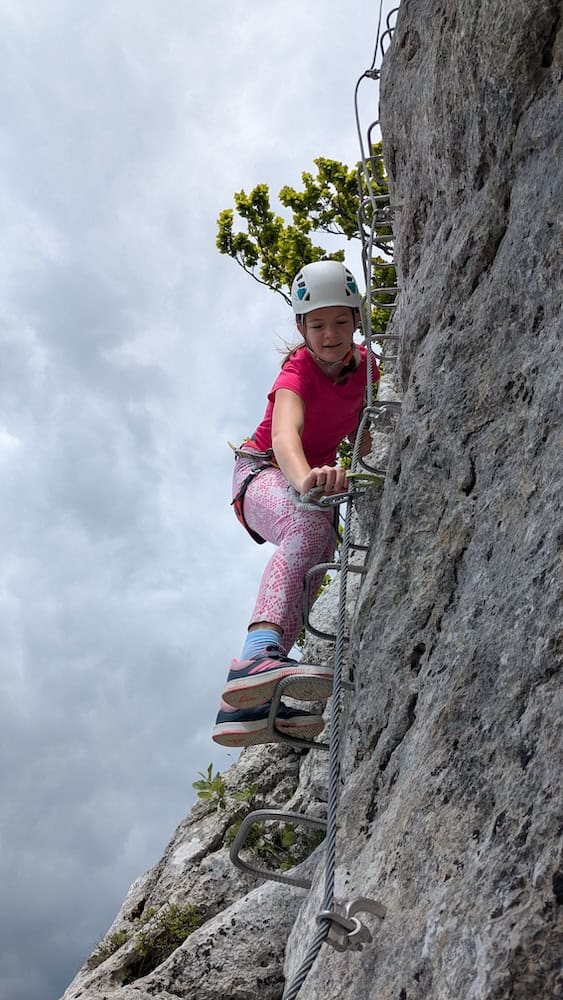 Via Ferrata Bat on the steep ladder