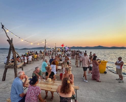People enjoying themselves at the Full Moon Festival in Zadar