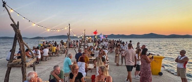 People enjoying themselves at the Full Moon Festival in Zadar