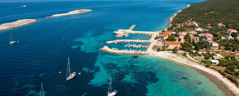 An aerial view of the main harbour on Premuda